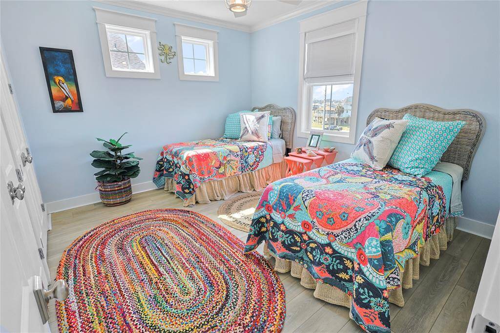 This secondary bedroom offers space for the whole family including ample walk-in closet space.