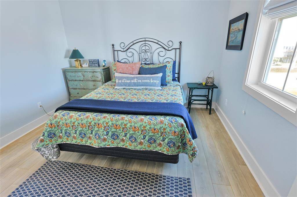 This bedroom features the perfect view of the gulf right from the comfort of your bed.