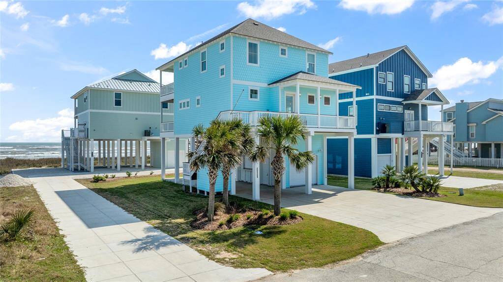 This second-row beach home offers the best of both worlds—easy beach access like a front-row home, but with added protection from the elements, minimizing maintenance while maximizing coastal living.