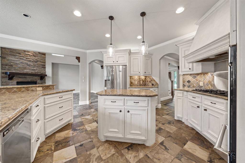 The spacious walk-in pantry offers plenty of storage to keep everything organized and within easy reach.