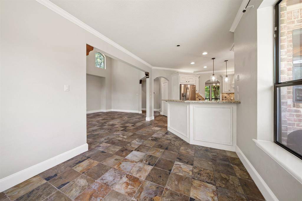 The open floor design of the house allows each area to flow seamlessly into the next, creating a harmonious and spacious living environment that’s perfect for both everyday life and entertaining.