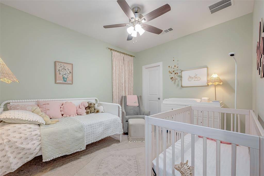 This room offers a warm and inviting ambiance with soft pastel colors and ample lighting. Walk-in Closet and high ceilings. One of 4 bedrooms in this gorgeous home.