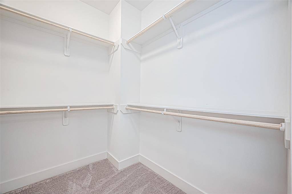 Another view of Second Large walk-in closet in Primary.