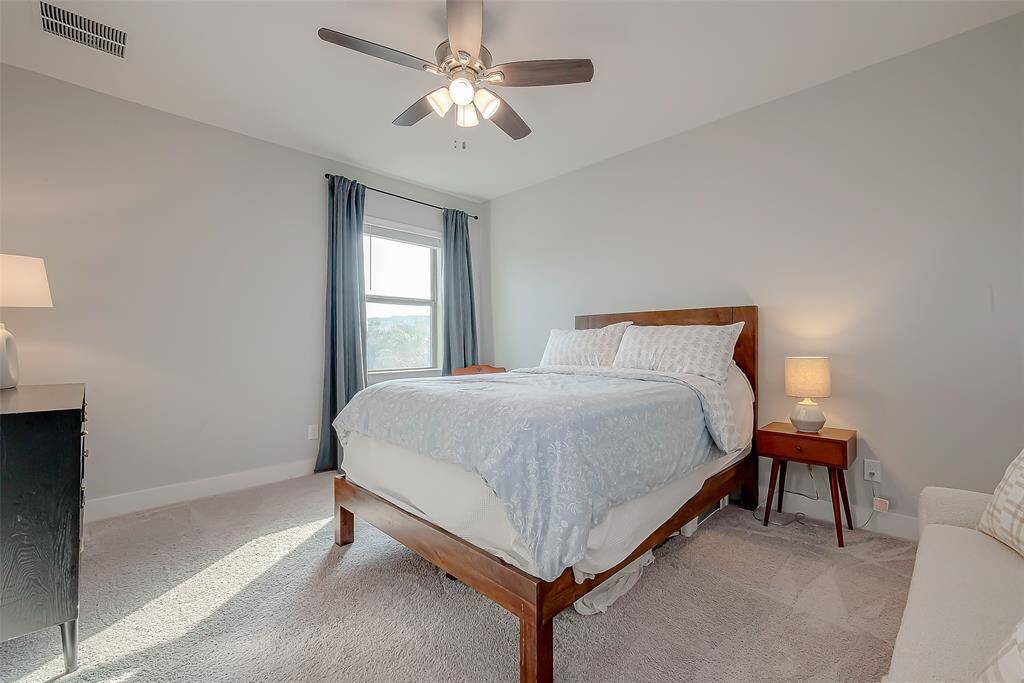 Bedroom #4 on the 3rd floor, is very large with a nice size walk-in Closet. High ceilings, ceiling fan, with lots of natural lighting.The energy efficient attic above has radium barrier, with R38 batting in the inaccessible areas and R38 blown in the accessible attic area.