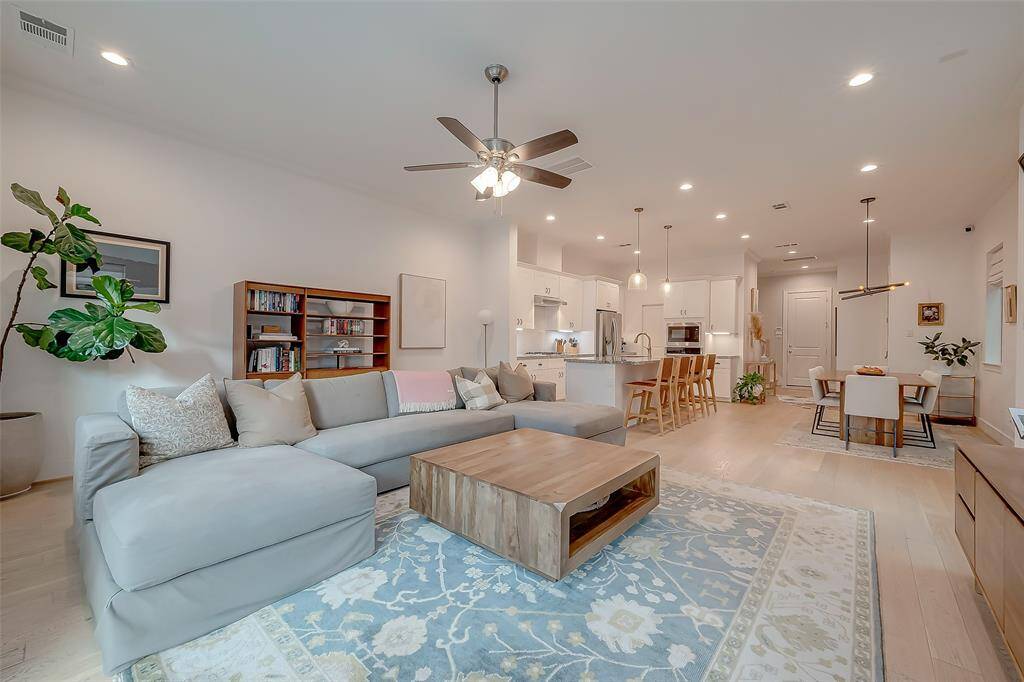 Stunning open living area. Energy efficient fan and windows. Well lit by day with natural lighting, and by night with recessed lighting throughout this gorgeous home.