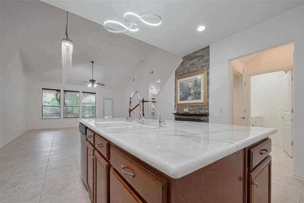 Spacious kitchen island featuring dual sinks for added convenience.