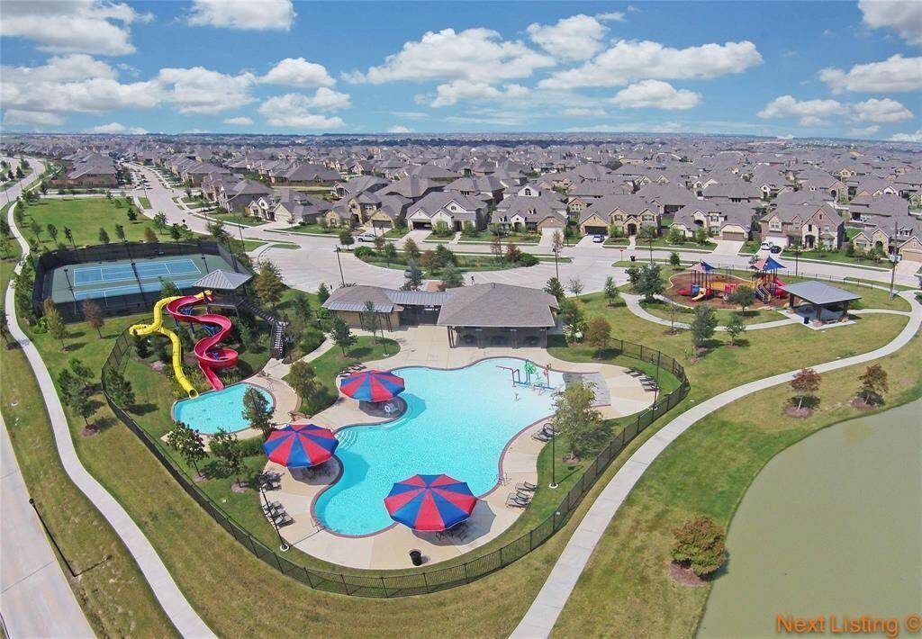 Experience luxury at Cinco Ranch with access to 11 stunning pools for endless relaxation and fun.