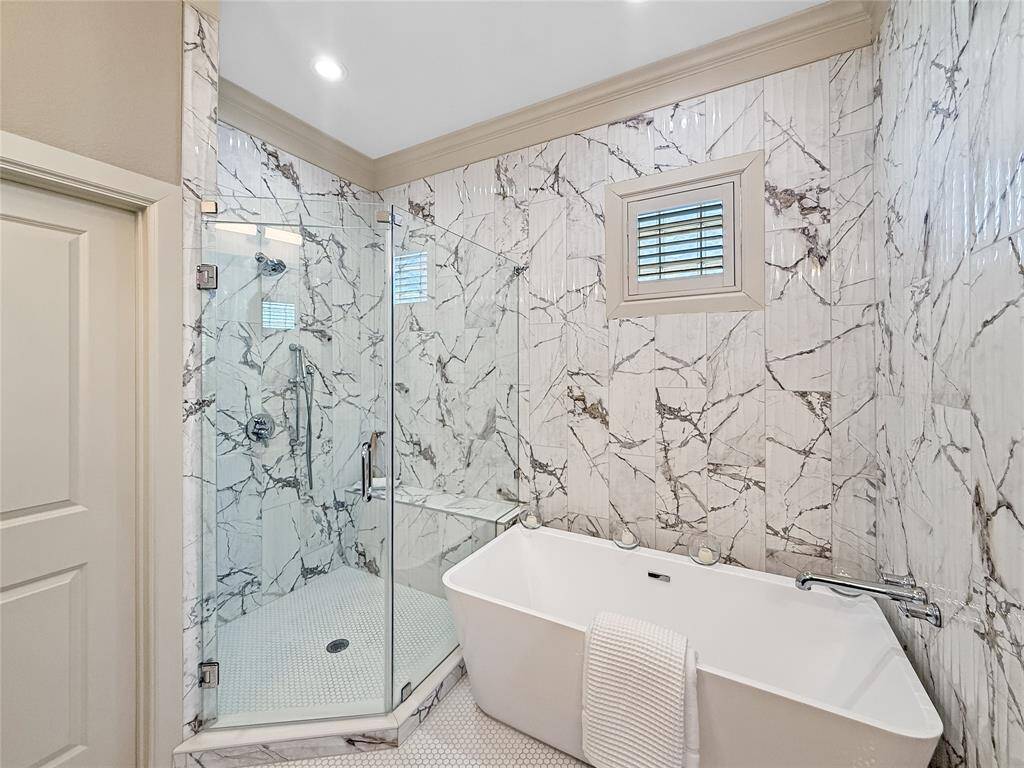 Spa-like bath with separate Tub and shower.