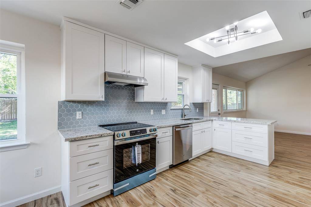 The kitchen has been thoughtfully opened up, providing the chef with plenty of space to create culinary masterpieces