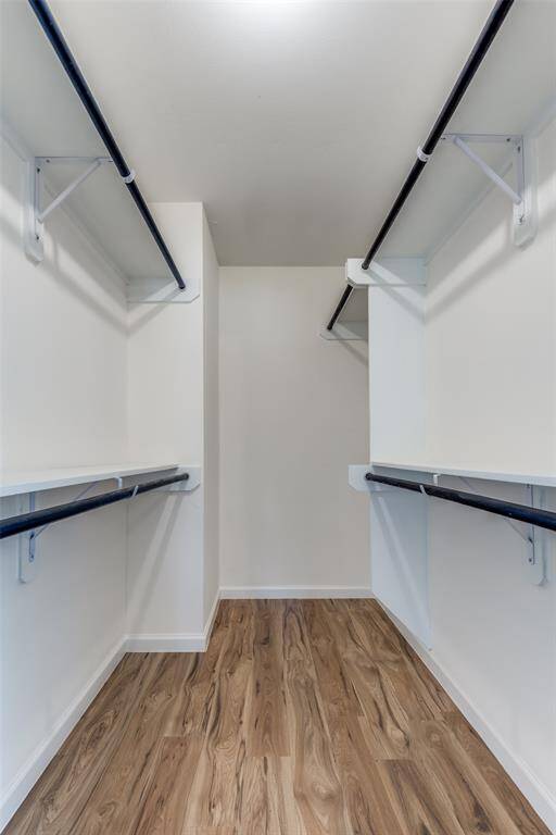 Spacious primary closet, providing room for all your wardrobe essentials