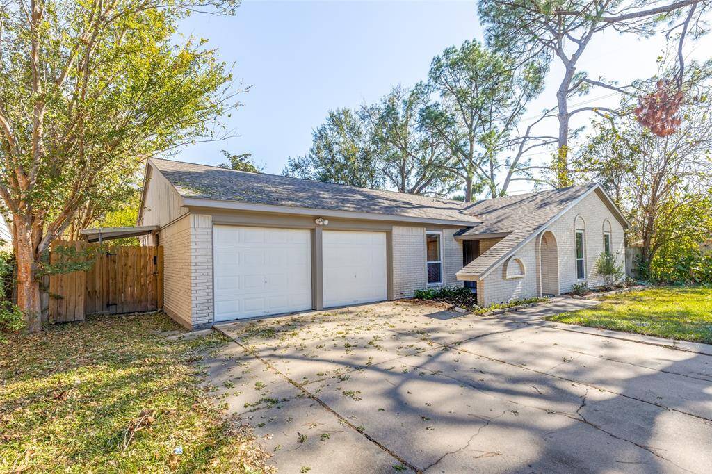 Two-car garage offering plenty of space to accommodate your vehicles and storage needs