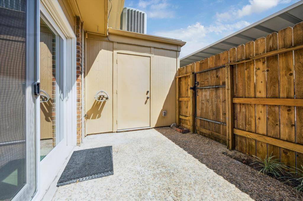Oversized storage room by your two covered parking spaces