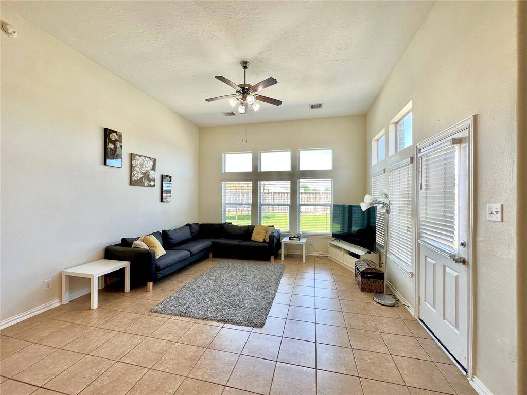 Spacious living room with high ceilings