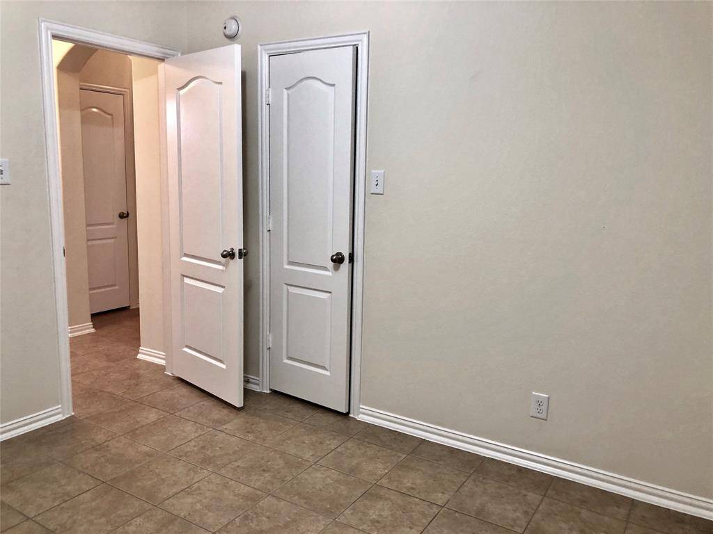 Secondary bedroom with closet (previous photo)
