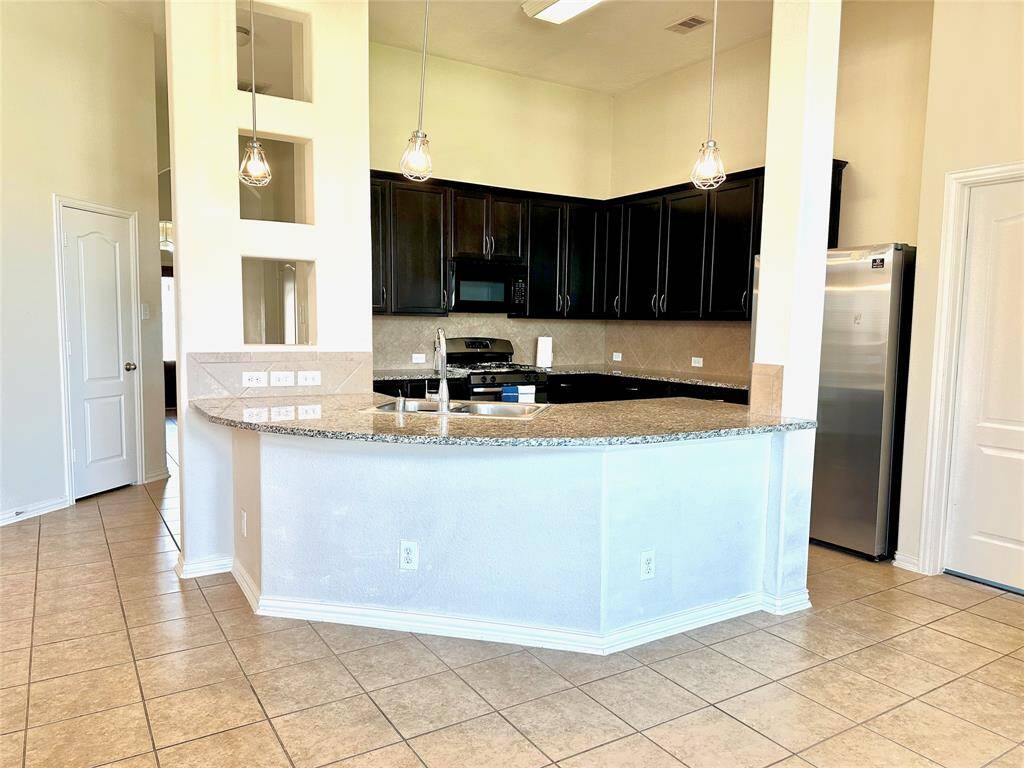Spacious open kitchenPictures from previous listing for marketing purposes.