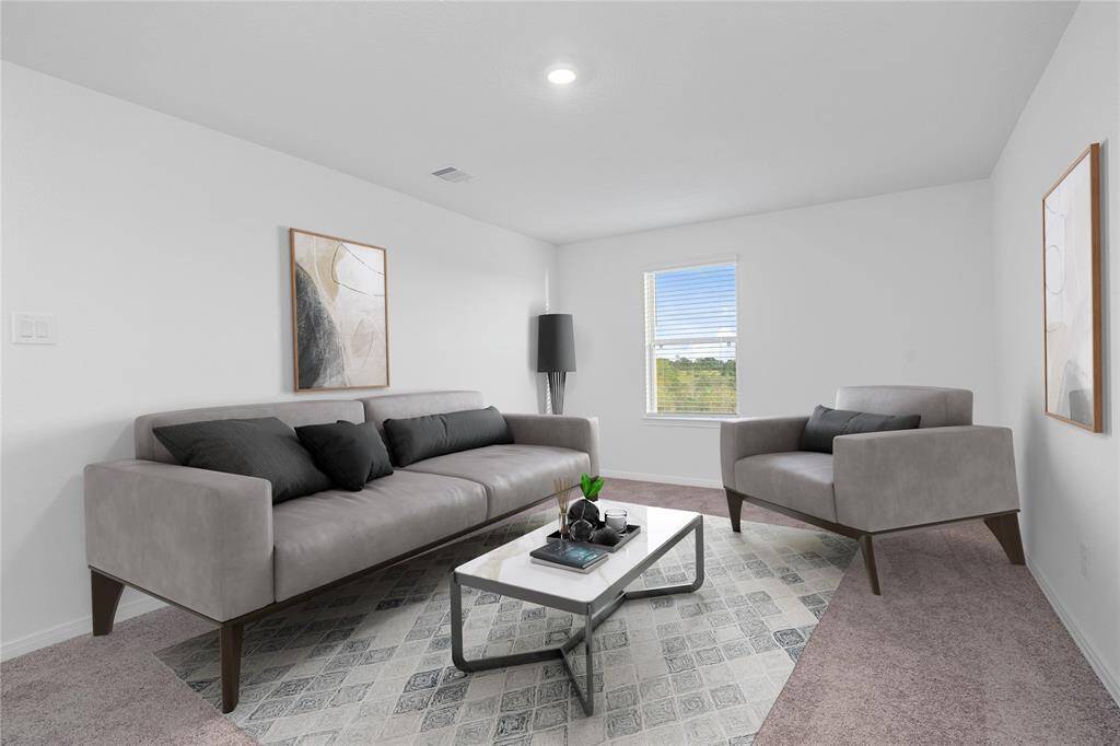 Come upstairs and enjoy a day of leisure in this fabulous loft! This is the perfect hangout spot or adult game room, this space features plush carpet, high vaulted ceiling, recessed lighting, custom paint and large window with privacy blinds!