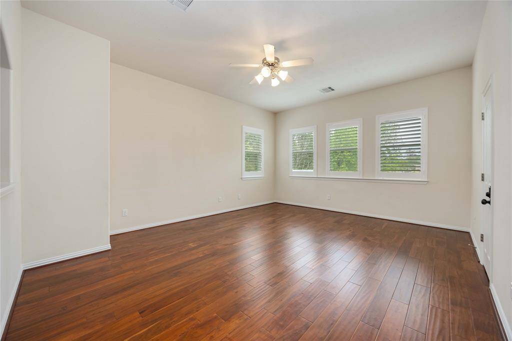 A spacious game room upstairs holds plenty of space for movie night or game night!