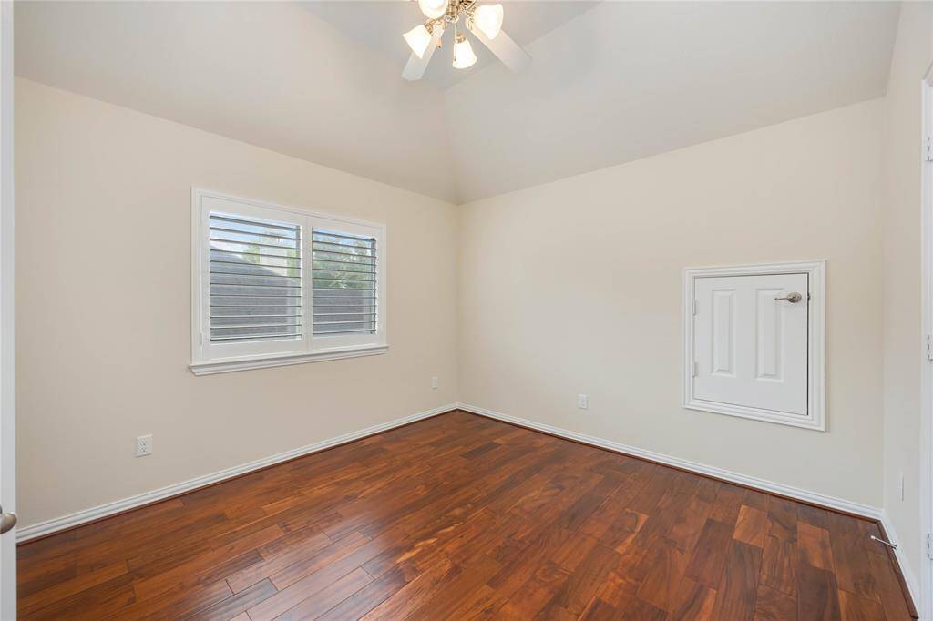 Bedroom 3 features a vaulted ceiling.