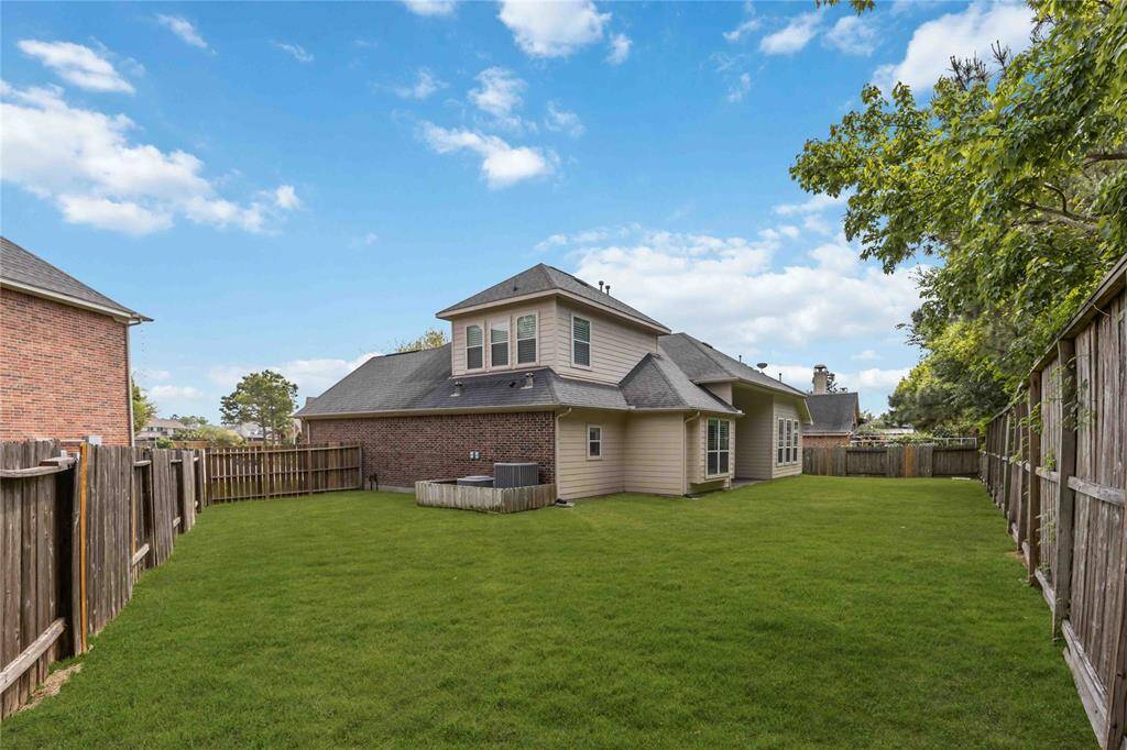 This backyard is huge, perfect for some play equipment and hours of fun in the sun.