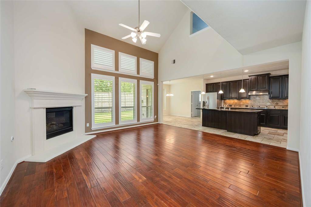 The open floor plan showcases a natural flow between the living room and kitchen.