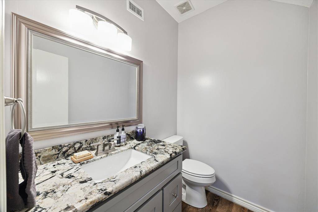 Conveniently located downstairs guest bathroom with modern finishes, ideal for entertaining.