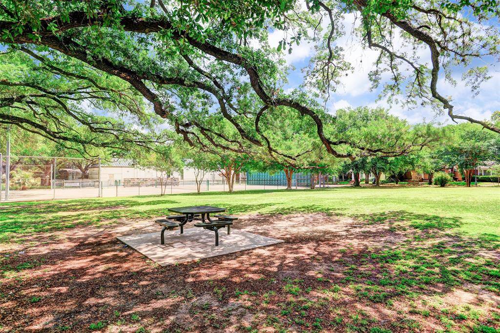 A playground, tennis courts, recreation center and plenty of space to have children and pets play.