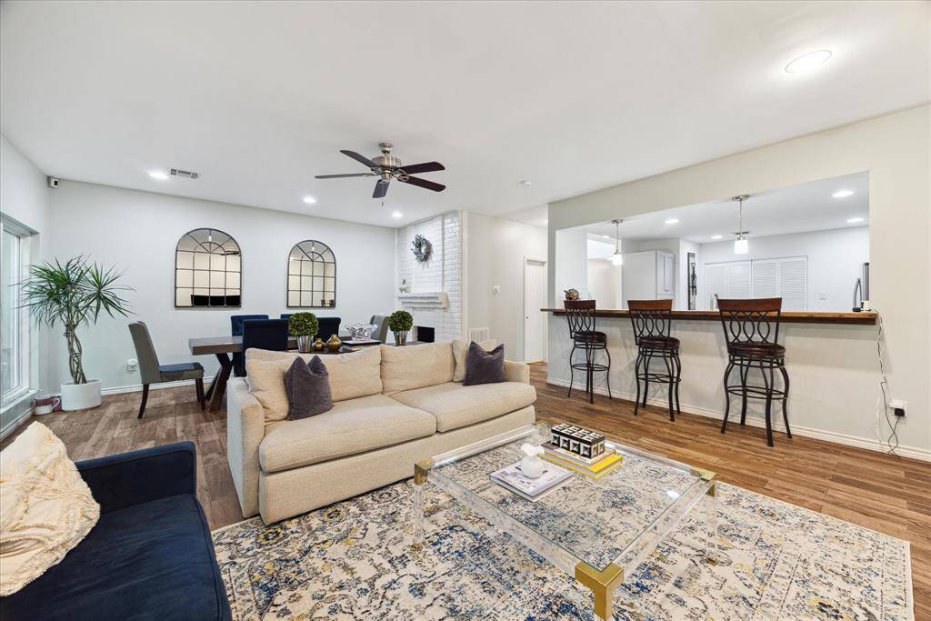 Seamless living with this elegant open-concept space, featuring a harmonious blend of living, dining, and kitchen areas, perfect for modern living.