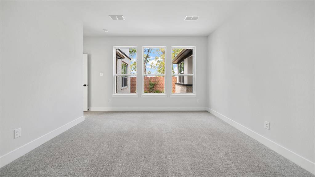 *REPRESENTATIVE PHOTO* Main Bedroom with View of Courtyard