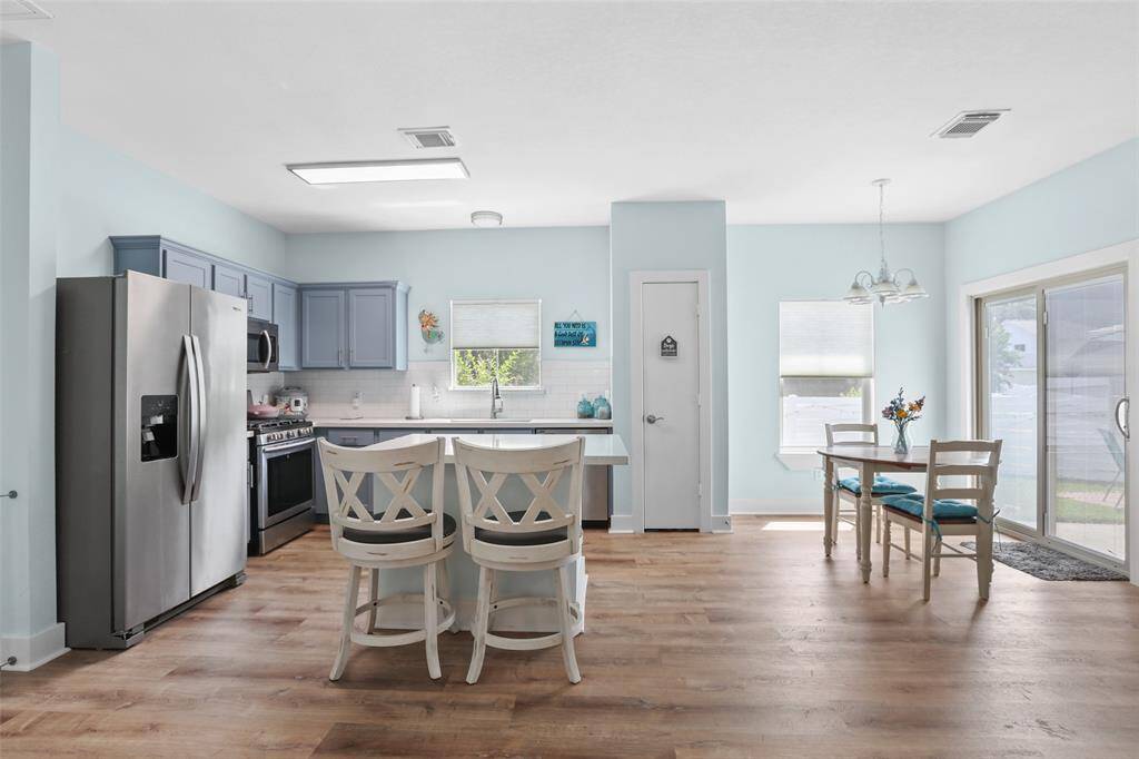 Kitchen is updated with stainless steal appliance and beautiful quartz countertops.