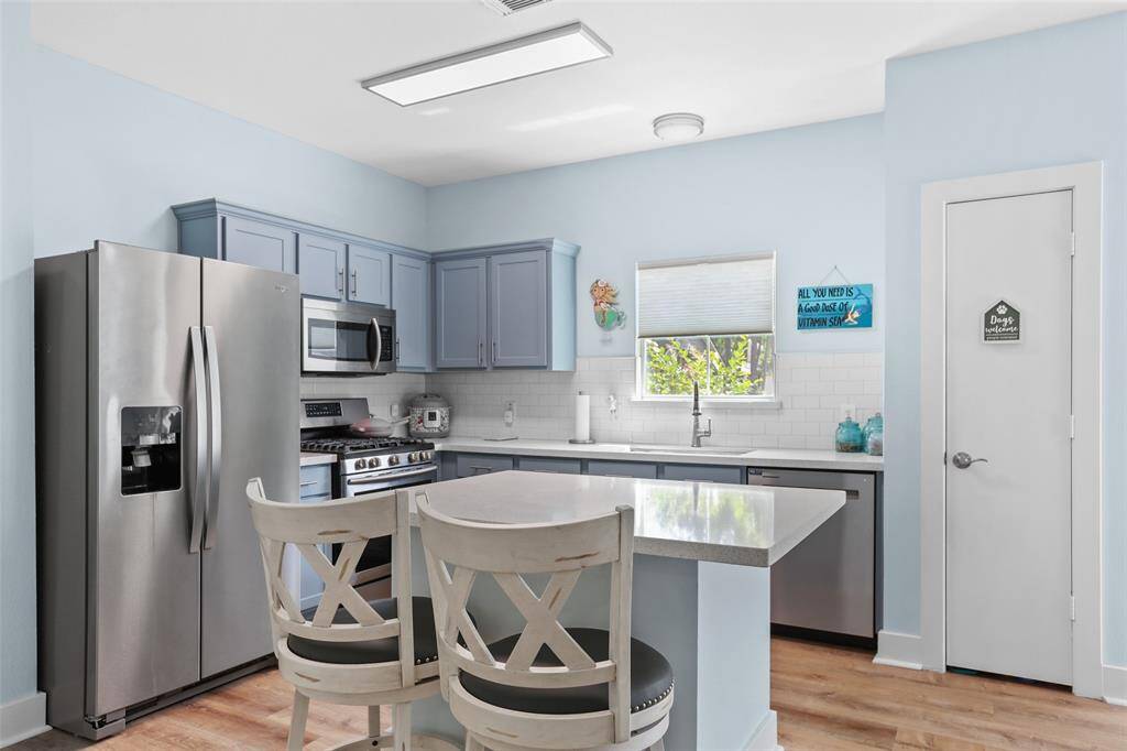 The kitchen is light and bright.