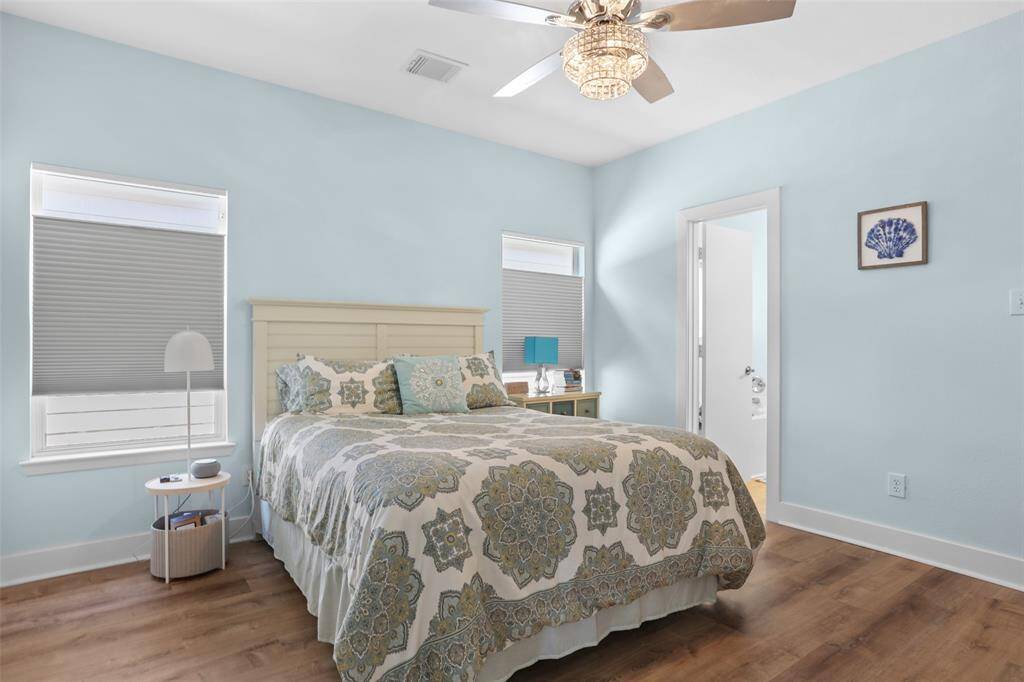 Primary Bedroom is roomy, light and bright.