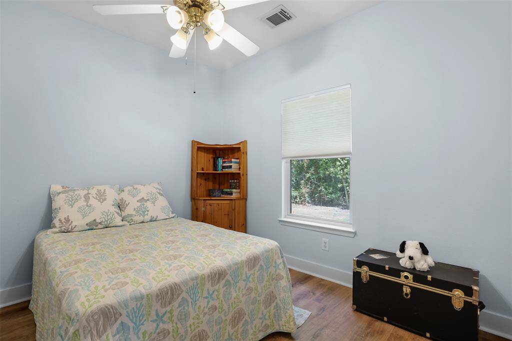 Secondary bedroom is filled with natural light.