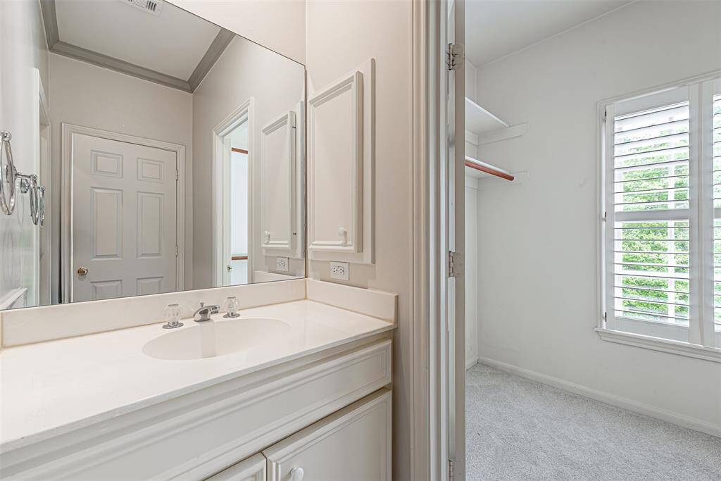 Second bedroom on 2nd floor with adjoining bath and recent carpet.