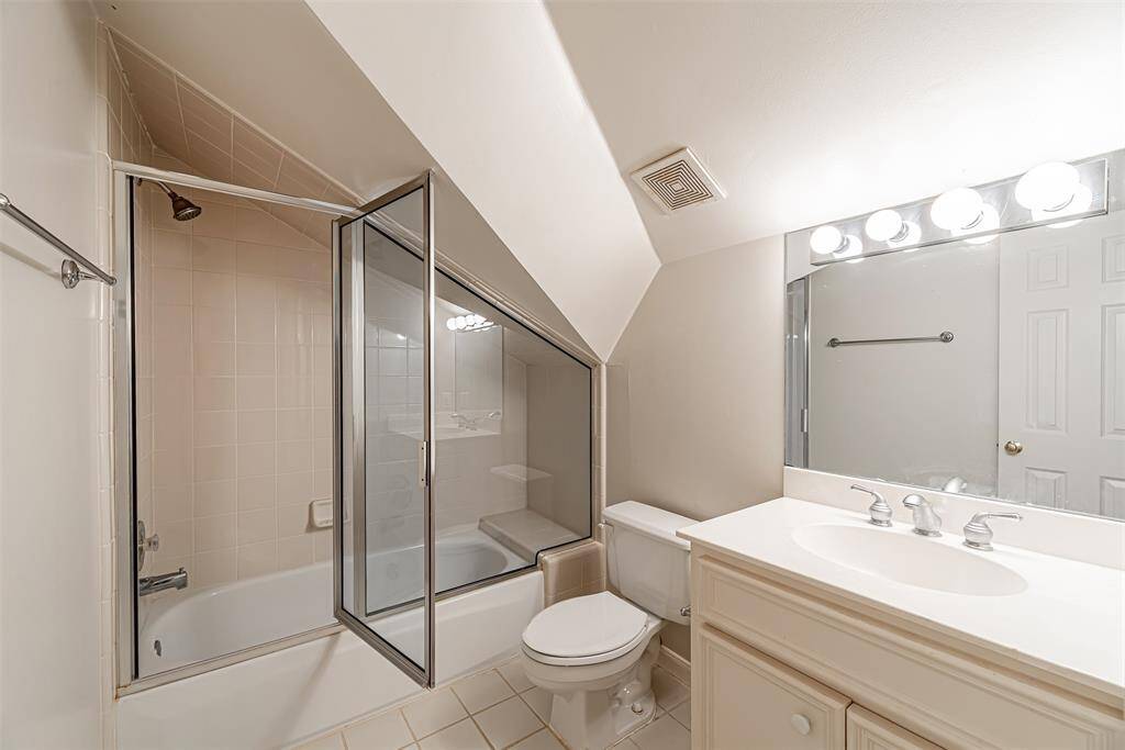Third floor extra space, flex room! Could be another bedroom or kids playroom or a media room! Full bathroom shown in the back.