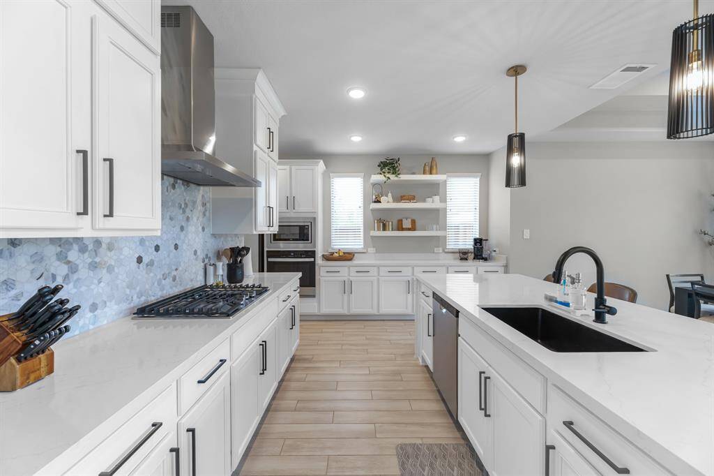 Ample prep and storage space in the bright and airy kitchen!