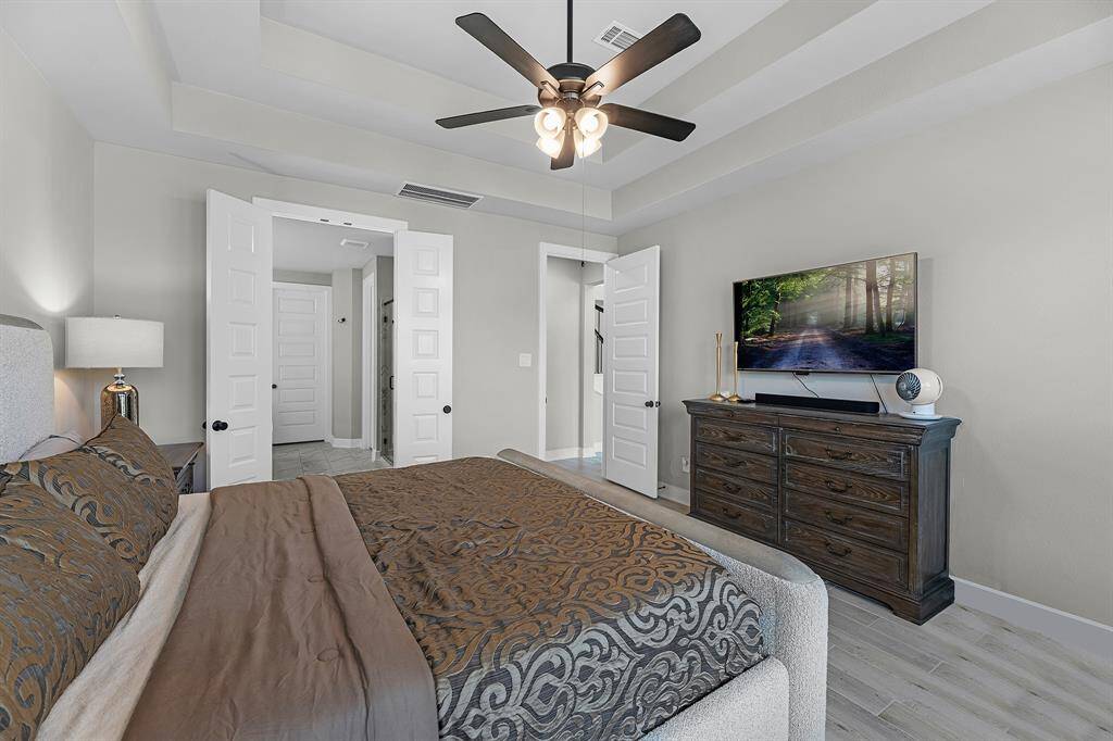 The primary bedroom features an en-suite bathroom.