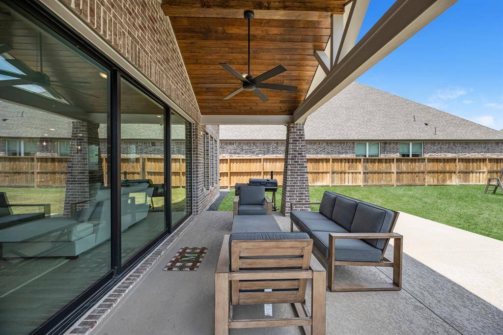 Daytime view of the covered back patio.
