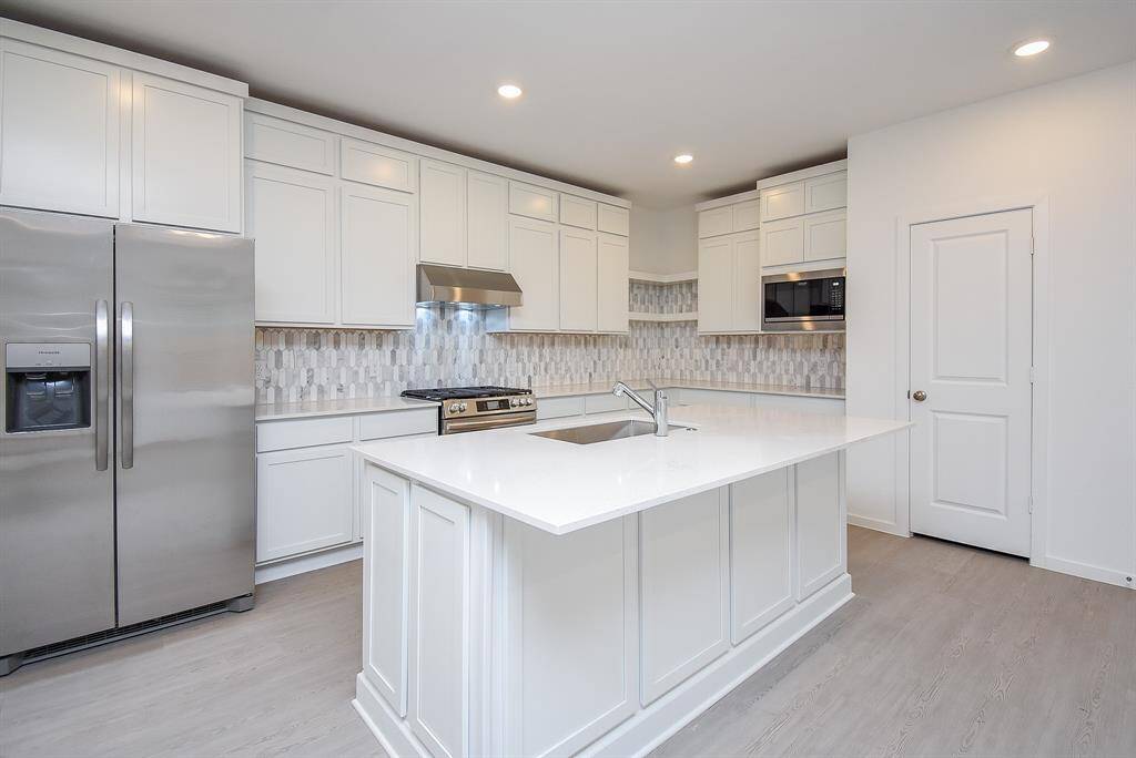Double row of kitchen cabinets