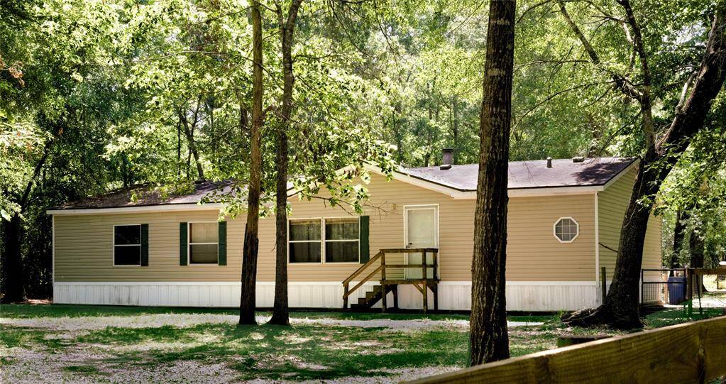2003 Manufactured Home with Country Charm – A perfect canvas, ready to be renovated into your dream home.