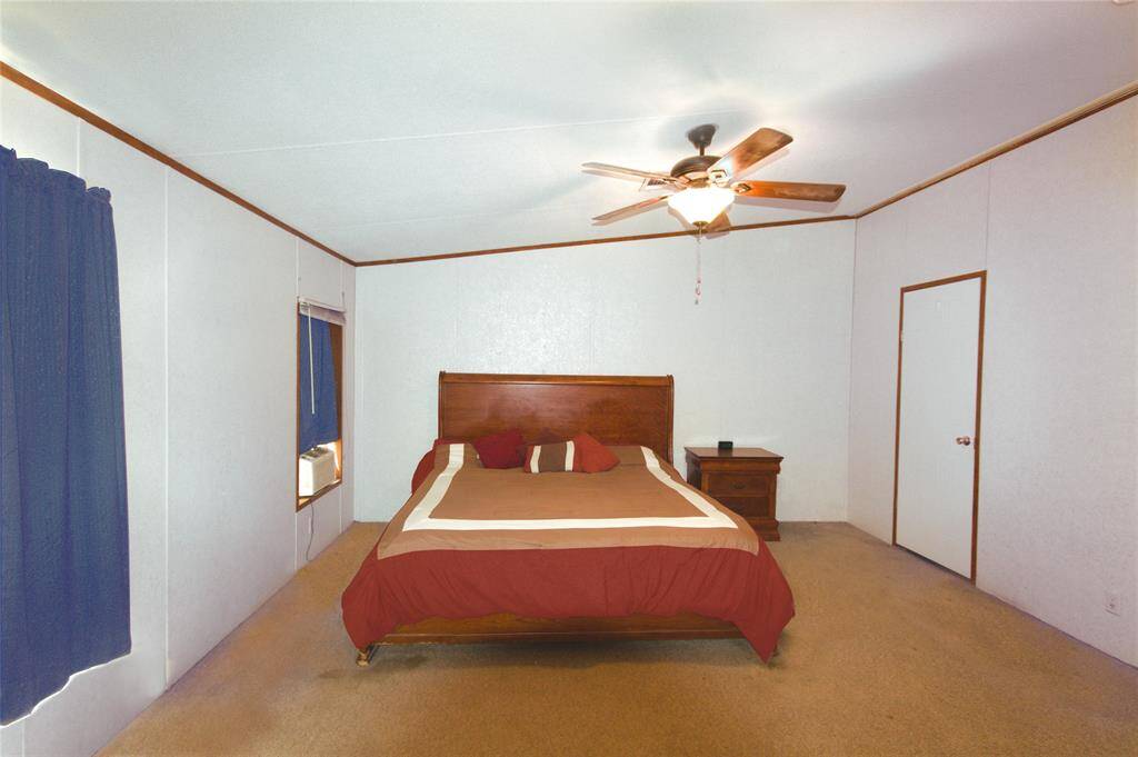 Retreat to this spacious 27' x 15' Primary Bedroom, a tranquil haven with a cozy seating area, perfect for quiet evenings and restful mornings!
