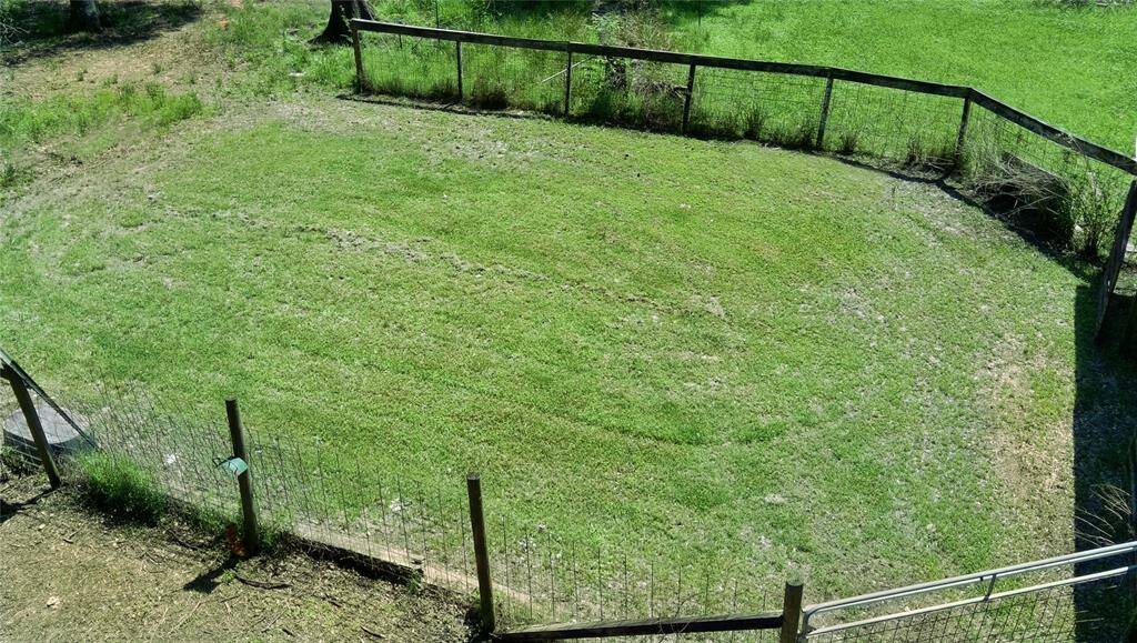Multiple fenced areas provide added functionality—perfect for pets, livestock, or creating separate outdoor spaces tailored to your needs.