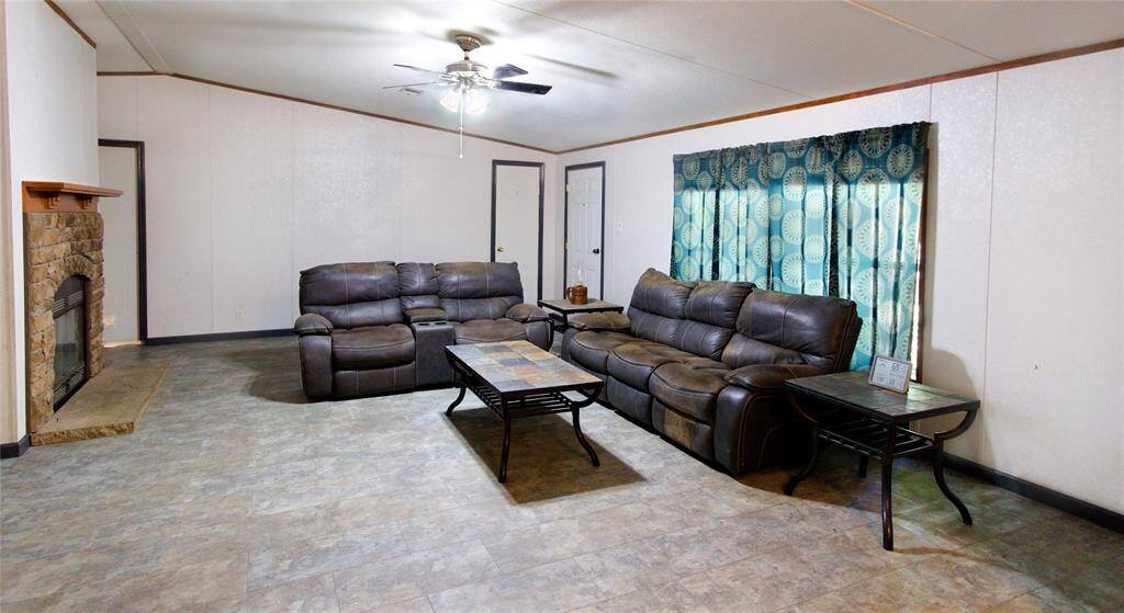 Discover country bliss in this warm 22' x 18' Living Area, a cozy retreat for relaxing evenings and joyful gatherings!