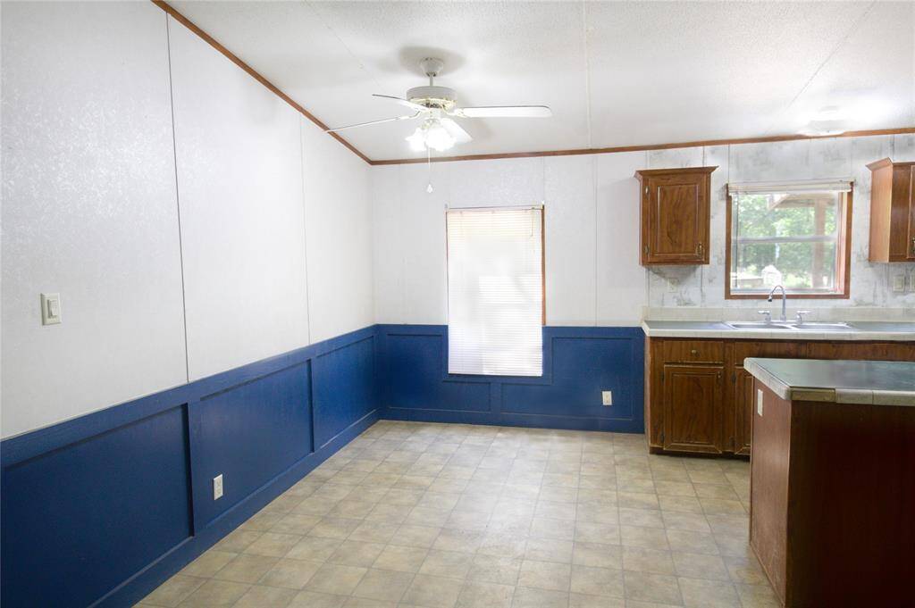 Savor the warmth of country living in this charming Breakfast Area, seamlessly attached to the kitchen, perfect for cozy mornings and heartfelt moments!