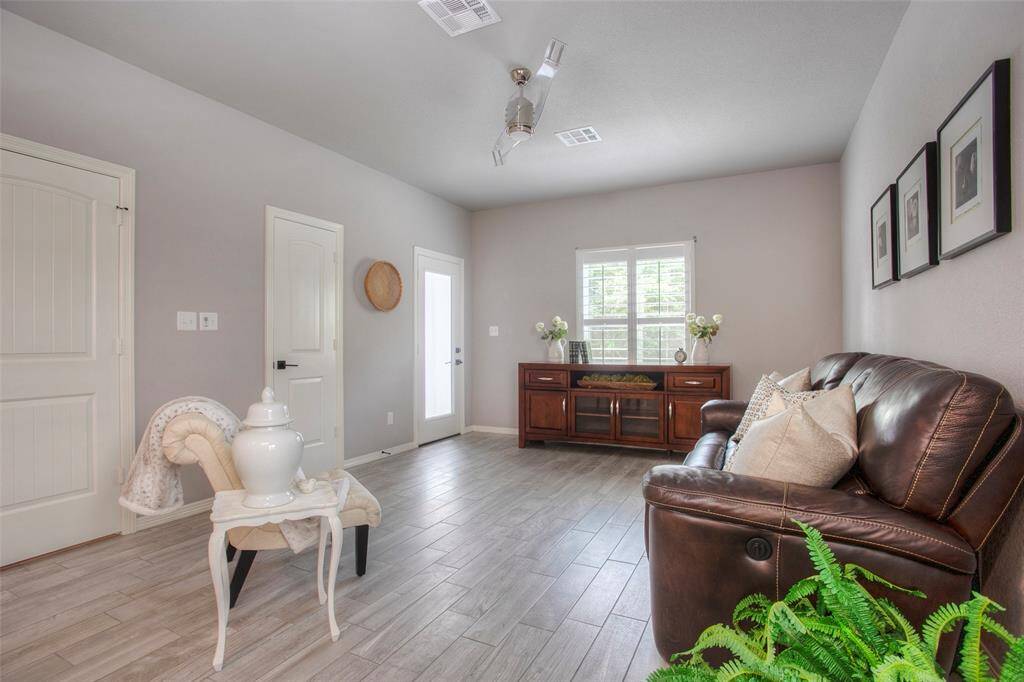 Beautiful wood-like tile flooring throughout the downstairs