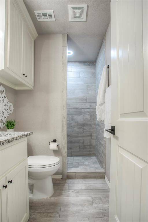 Primary suite bathroom with walk-in shower