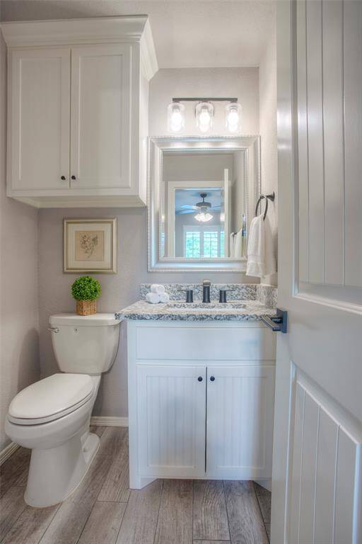Secondary bathroom vanity with granite countertops