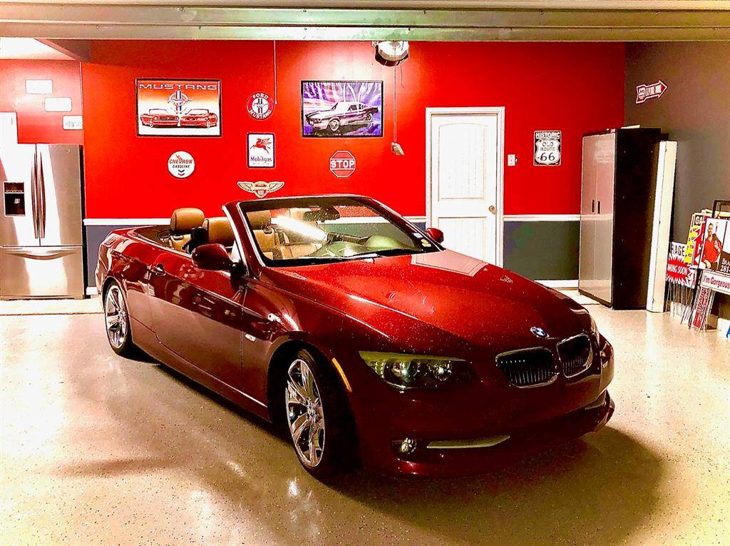 3-car garage with epoxy flooring and painted with chair rail and baseboards