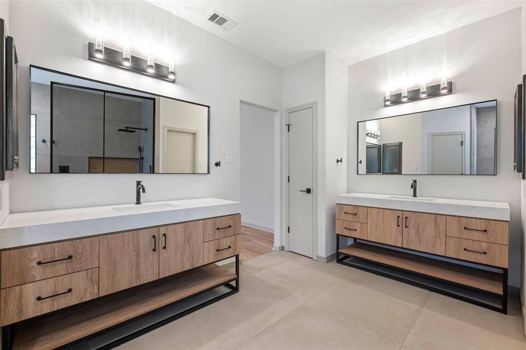 Double sinks and lots of cabinets