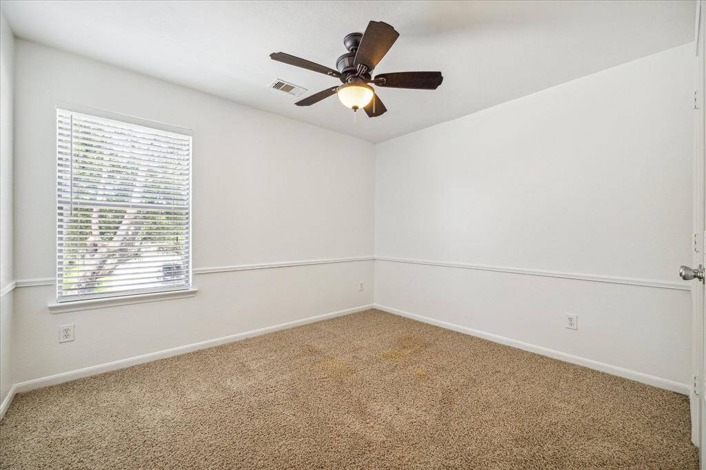 A fourth bedroom is also located upstairs.