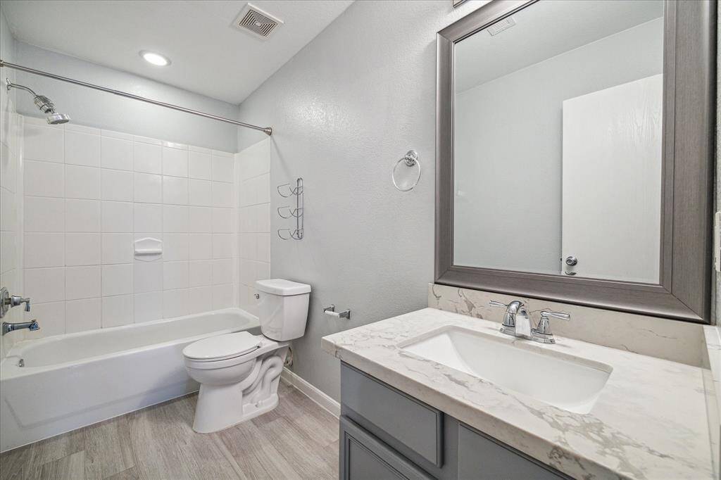 The redone secondary bathroom sits on the second floor.